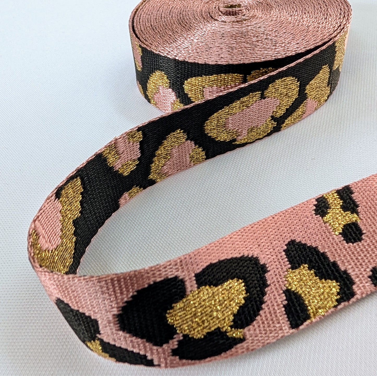 Sangle tachetée rose et noir