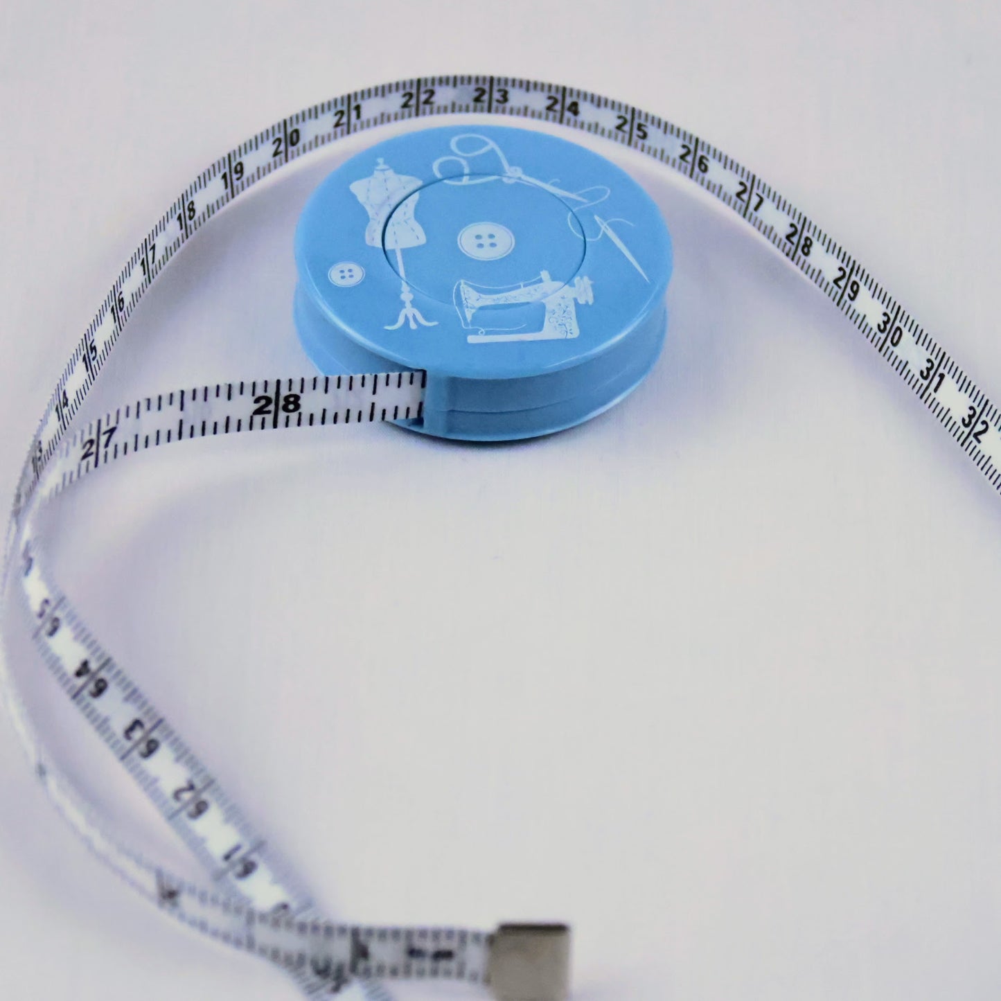 Mètre ruban de couture rétractable bleu