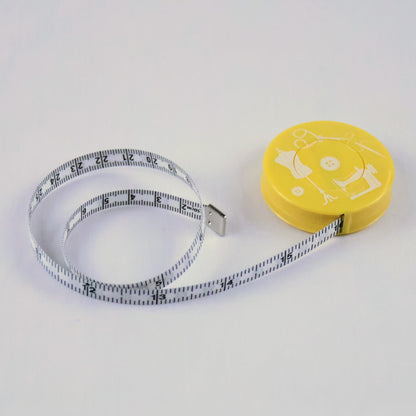 Mètre ruban de couture rétractable jaune