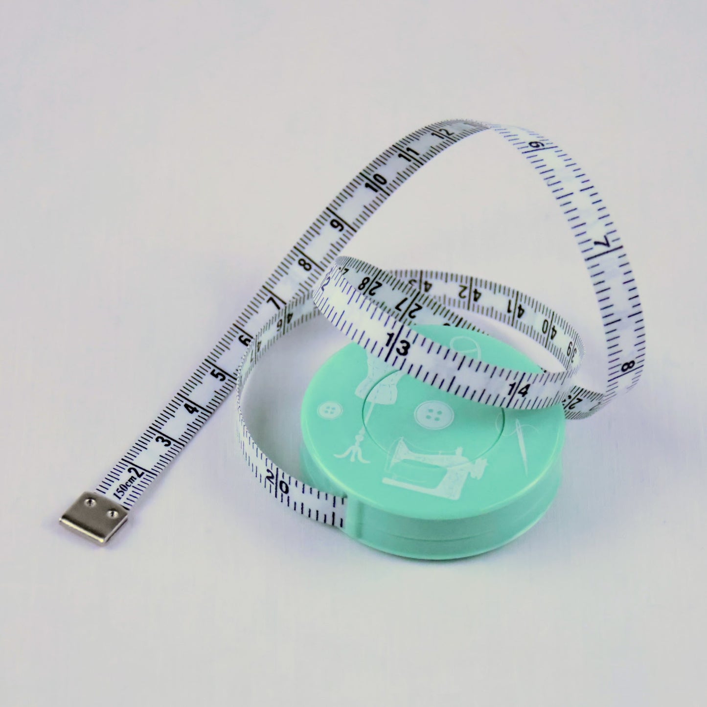 Mètre ruban de couture rétractable vert