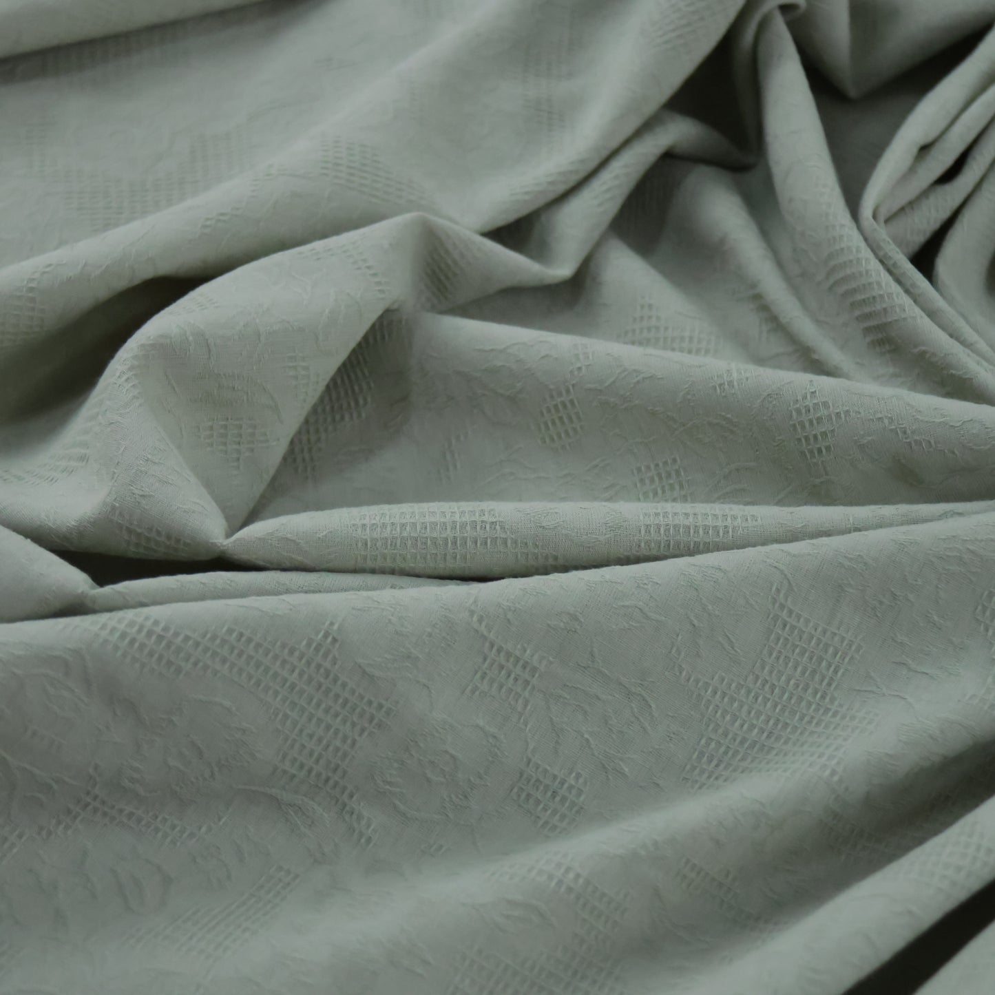Popeline jacquard vert amande