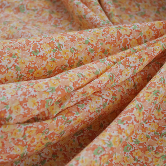 Popeline fleurie orange