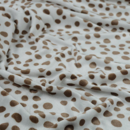 Polaire à pois marron sur fond blanc