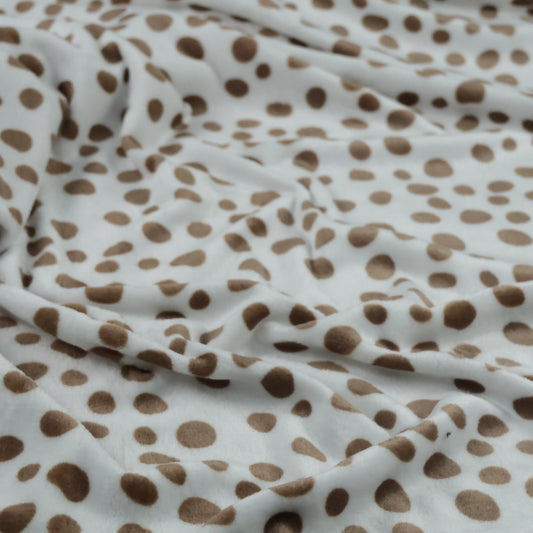 Polaire à pois marron sur fond blanc
