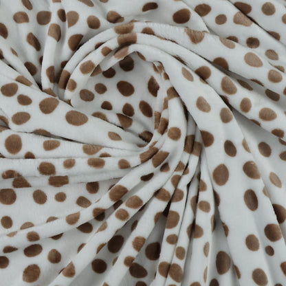 Polaire à pois marron sur fond blanc