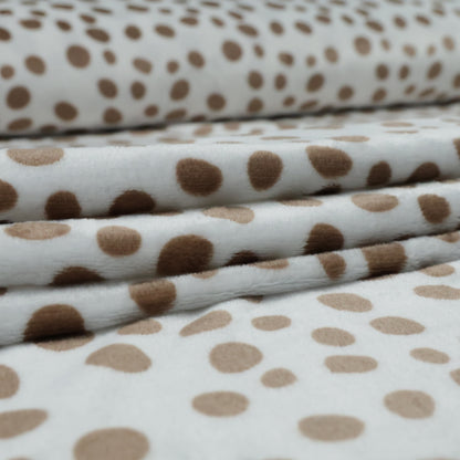 Polaire à pois marron sur fond blanc