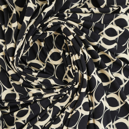 Jersey tourbillon beige sur fond noir