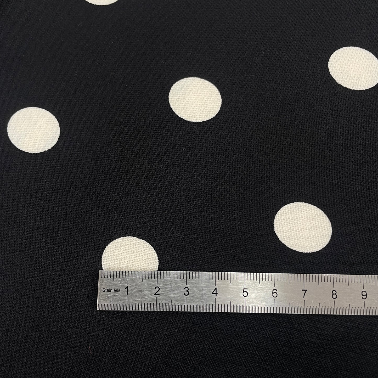 Viscose élasthanne noir à pois blanc