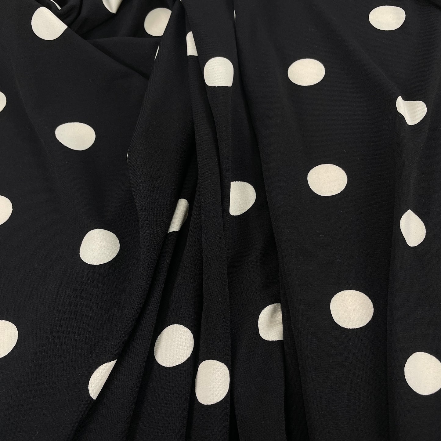 Viscose élasthanne noir à pois blanc