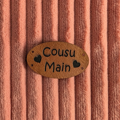 Etiquette "Cousu main"