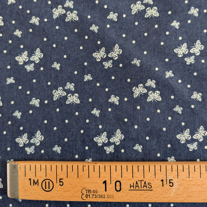 Chambray bleu foncé à papillons blancs